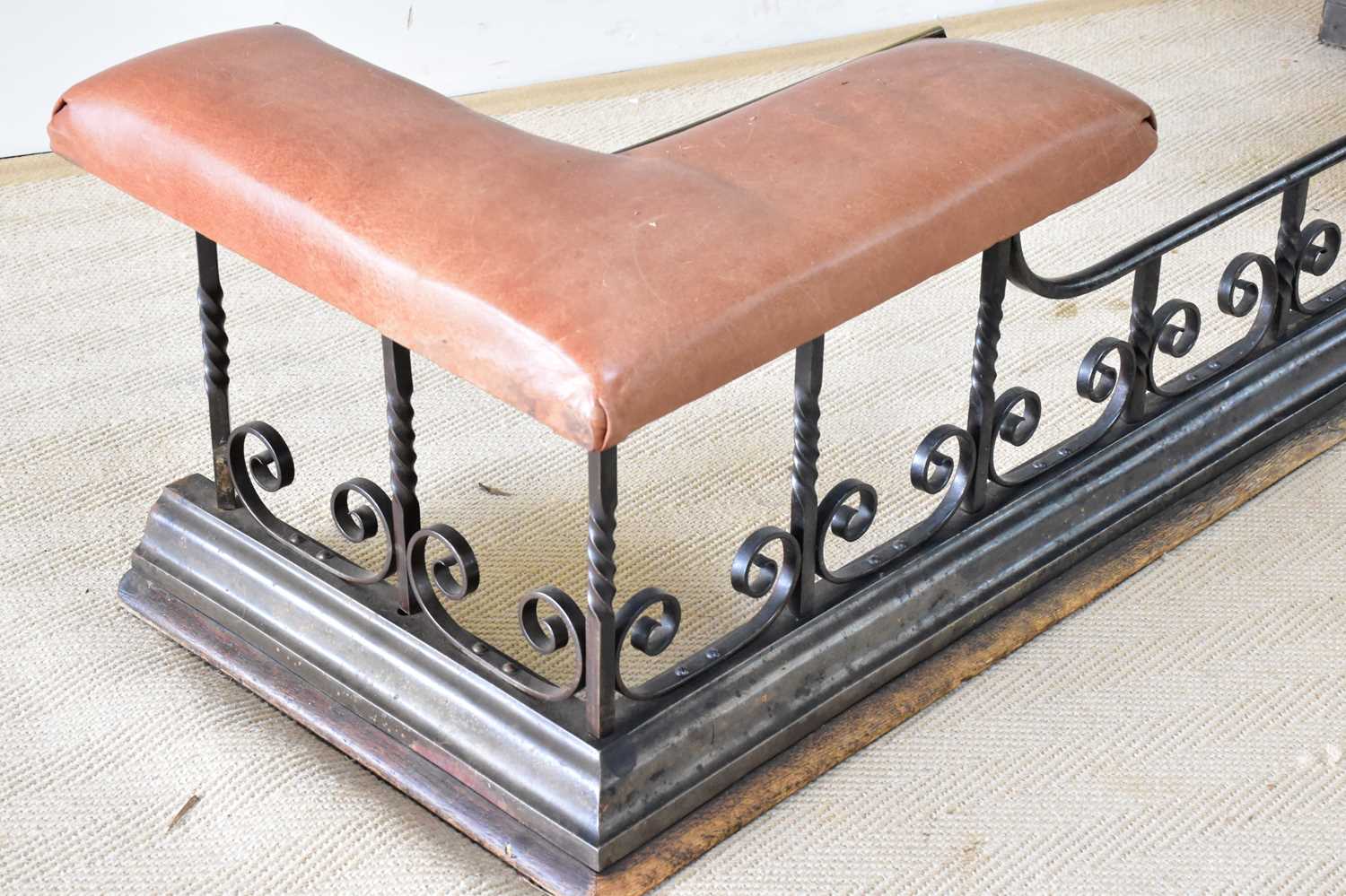 A wrought iron club fender with scrolling decoration and leather top, length 153cm. - Image 2 of 3