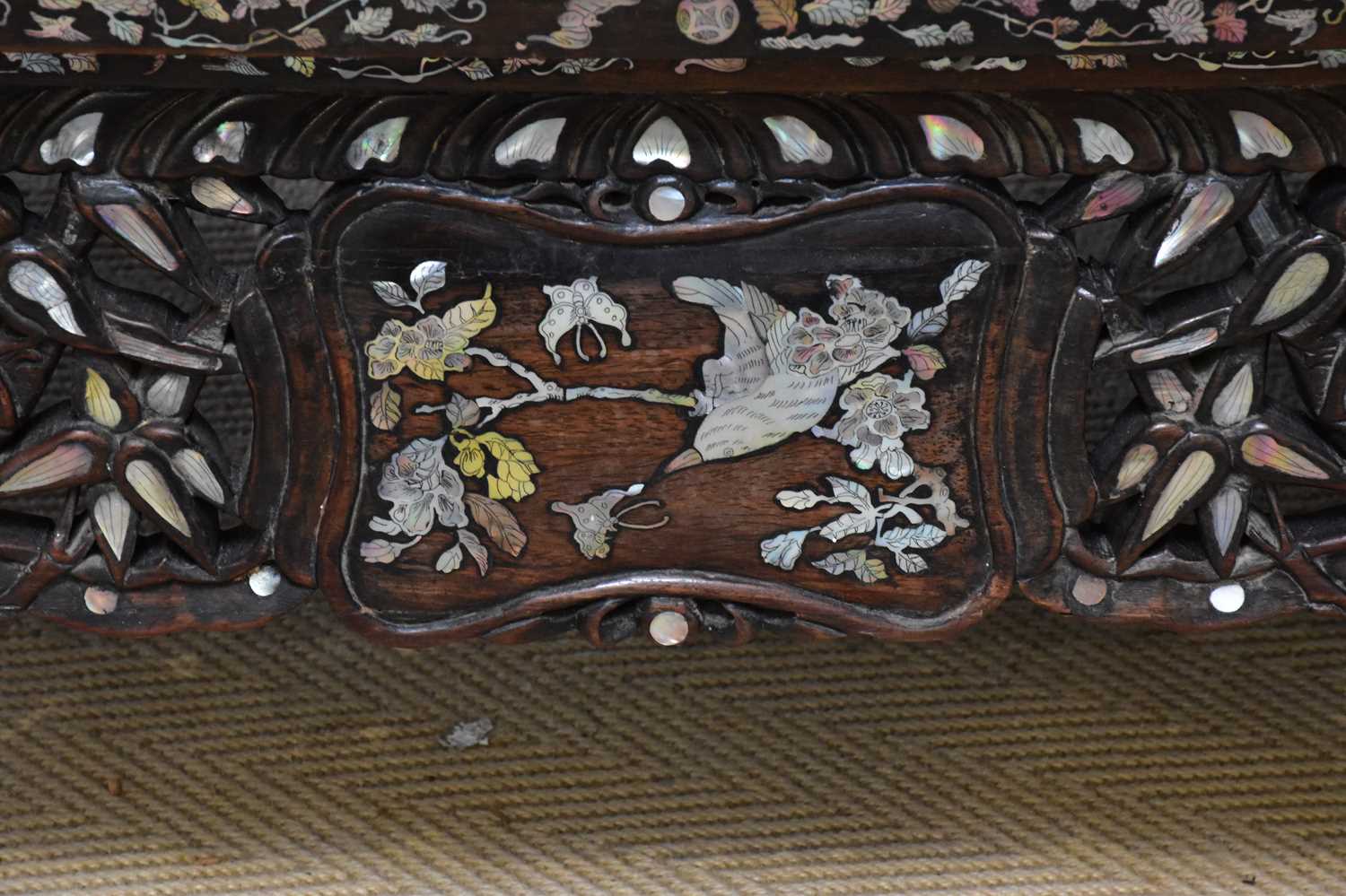 A Chinese ebonised carved display cabinet with mother of pearl inlaid decoration depicting - Image 6 of 13