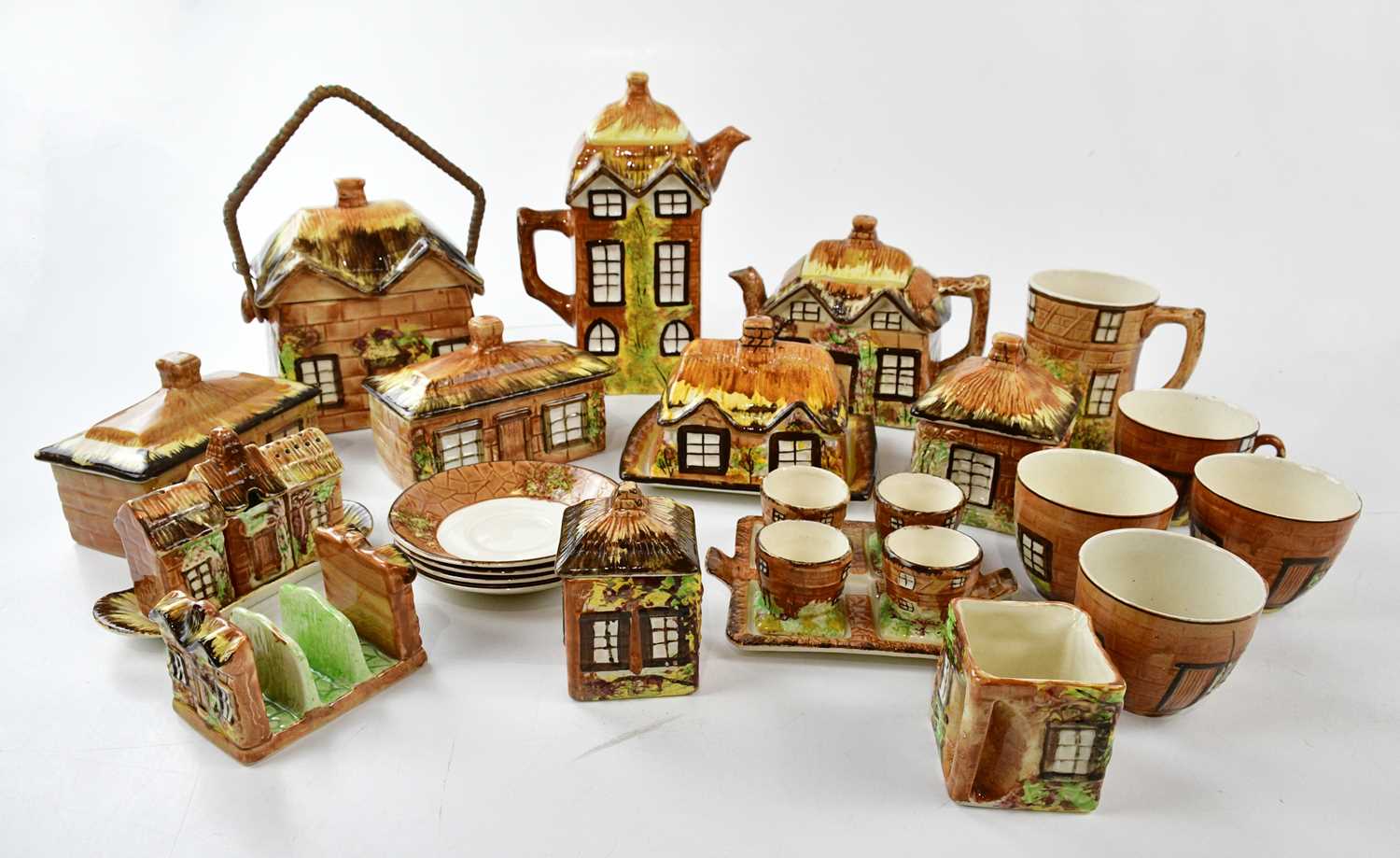 PRICE BROS; a quantity of assorted Cottage Ware including teapots, biscuit barrel, egg stand,