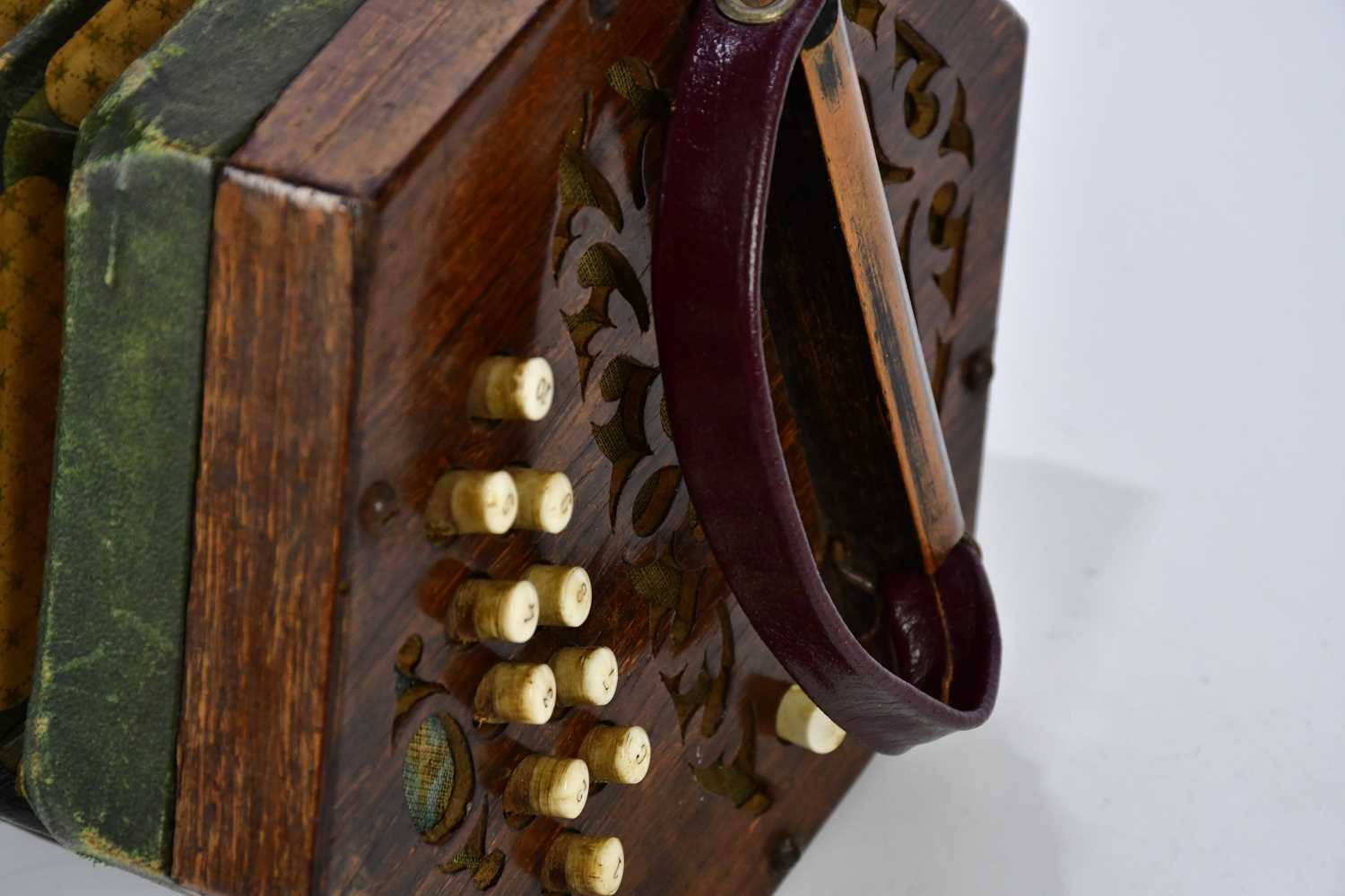 A late 19th century 21-key concertina. - Image 3 of 4