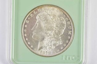 An encapsulated United States of America $1 coin, 1878, with Numistrust Corporation details.