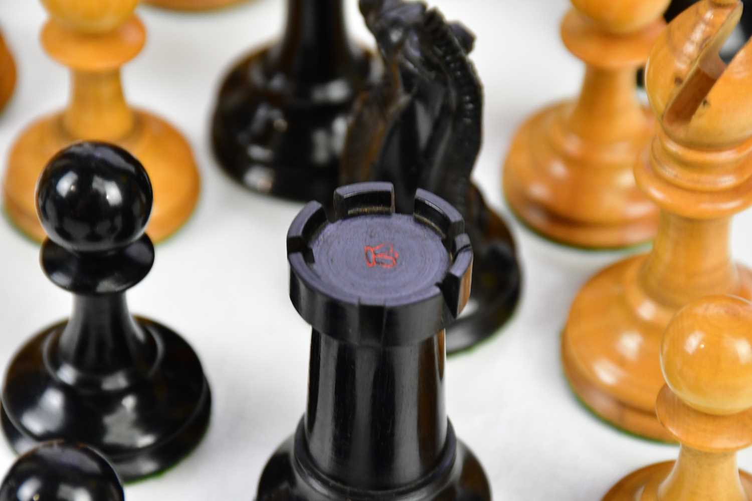 A Staunton pattern chess set in mahogany case, height of king 9.5cm, weighted. Condition Report: The - Image 4 of 5