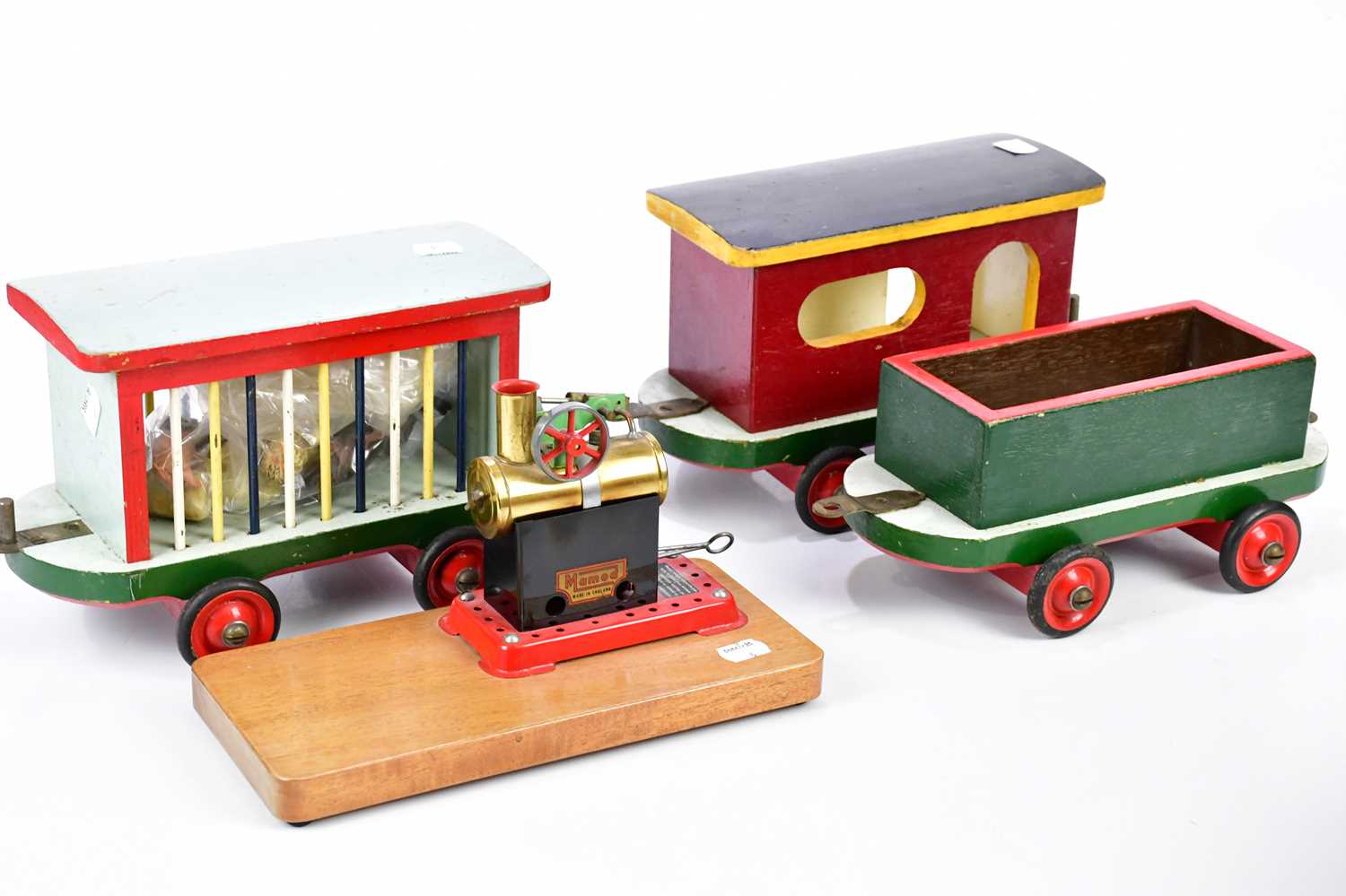 MAMOD; a boxed T.E.1a steam tractor, MAMOD engine mounted on plinth base and a wooden train.