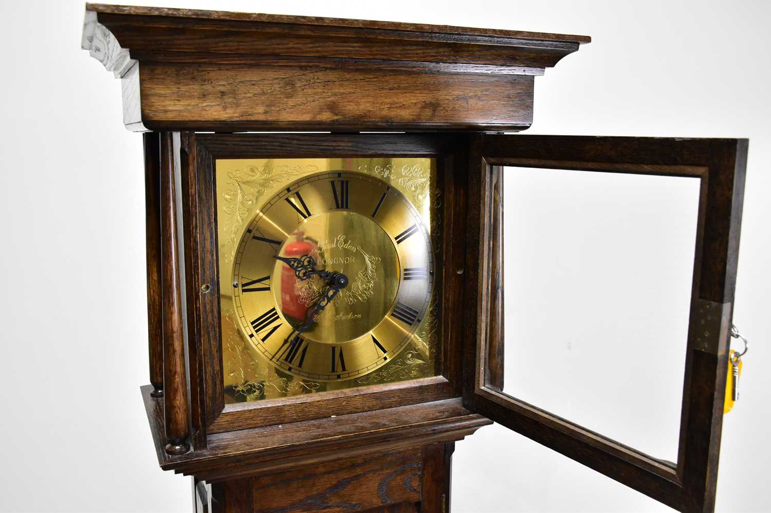 PAUL EDEN, LONGNOR; a reproduction oak longcase clock of small proportions, height 188cm. - Image 2 of 4