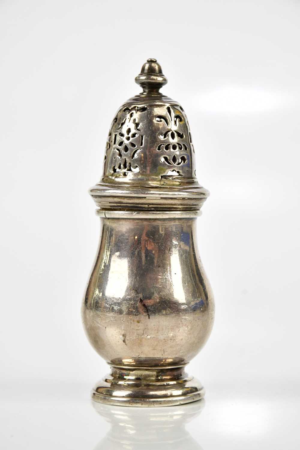 A George I hallmarked silver pepperette of baluster form, with cast acorn finial, the body - Image 2 of 5