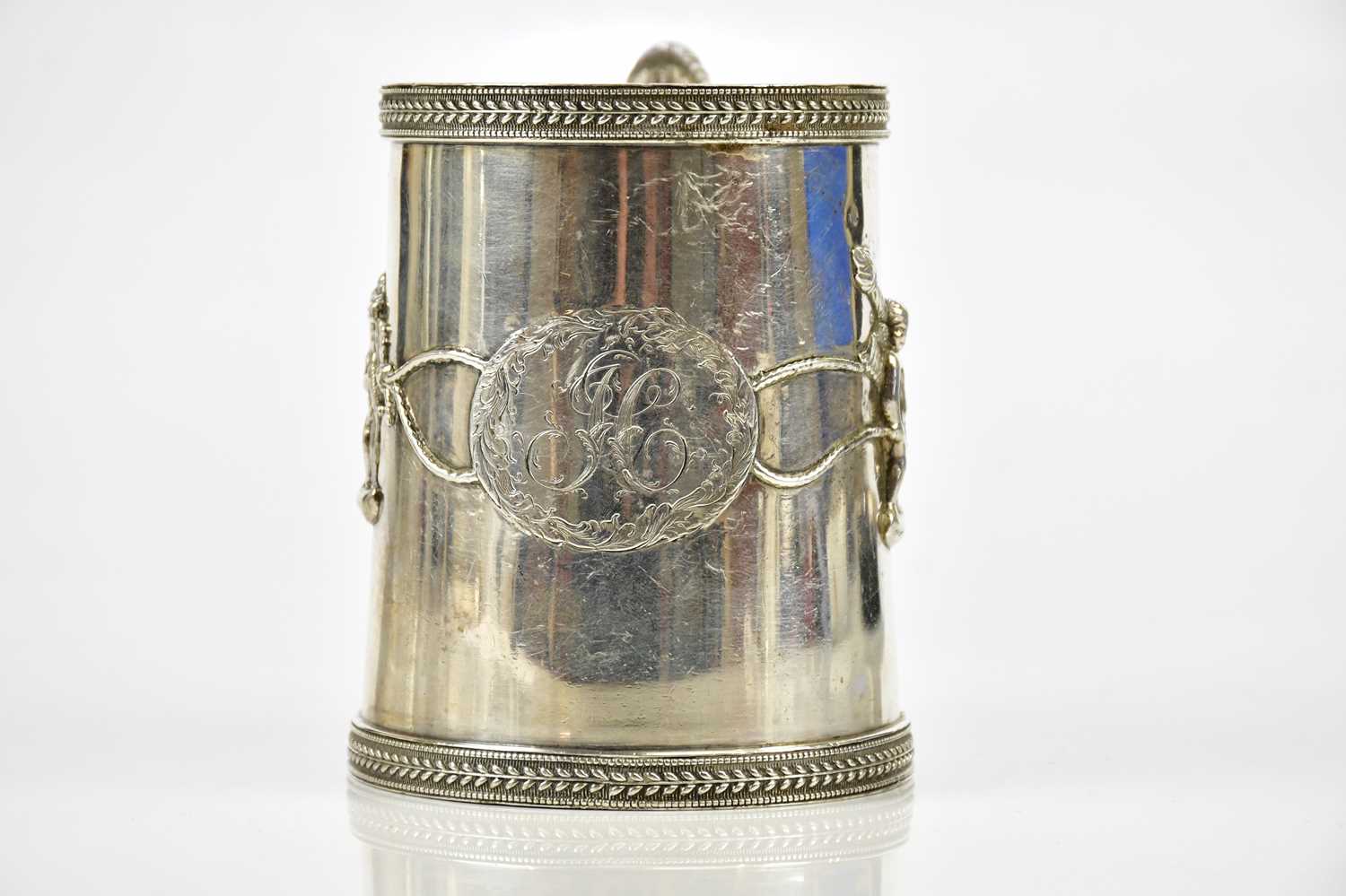 JOHN EMES; a George III hallmarked silver mug, with dolphin handle and cast borders within which - Image 2 of 6