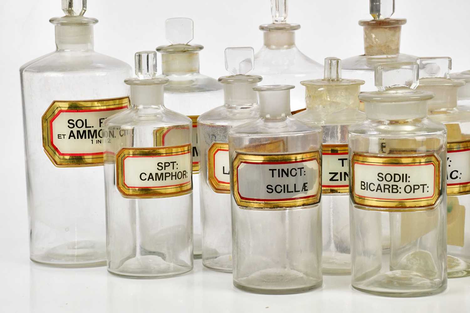 A collection of Victorian clear glass apothecary bottles predominantly with glass labels, various - Image 2 of 3