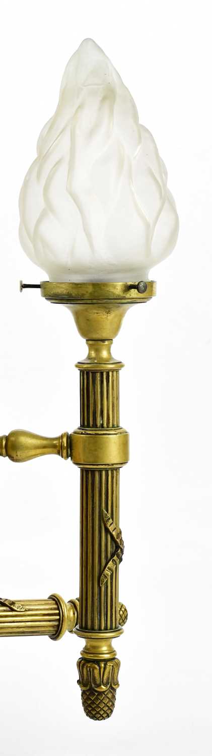 A pair of brass wall lights modelled as torches, with moulded frosted glass 'flame' shades, height - Bild 4 aus 4