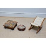 A late Victorian gout stool with floral tapestry panel, a Victorian tapestry topped stool and a