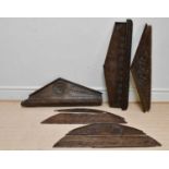 Three 19th century carved oak architectural pediments, the longest 119cm, with a further
