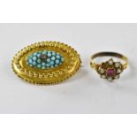 A Victorian yellow metal oval target mourning brooch set with turquoise and central diamond star and