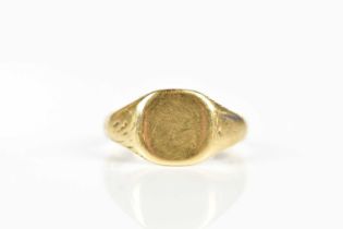 A 9ct yellow gold signet ring, size W, approx weight 6.3g.