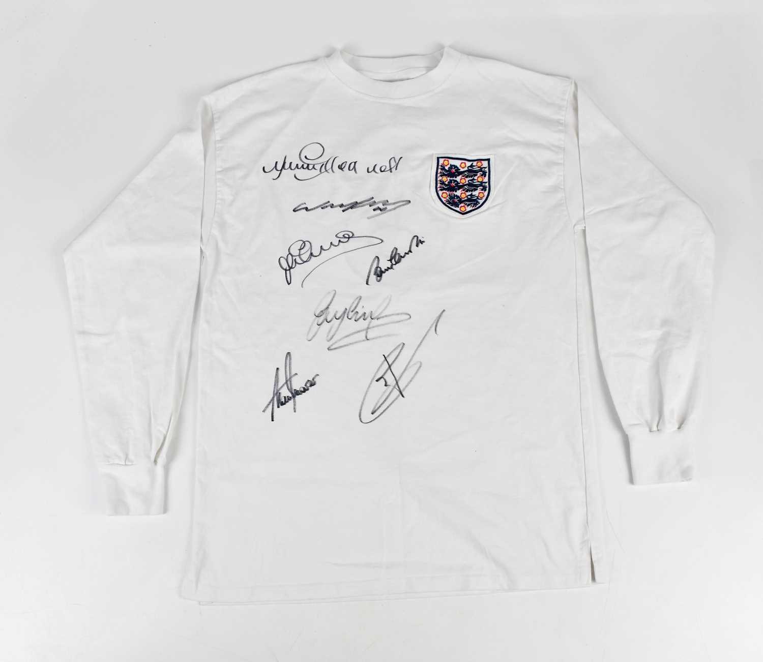 ENGLAND; a Top Scorers retro style football shirt, signed to the front Greaves, Kane, Owen,