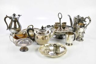 A collection of assorted plated items including trophy cup, egg cups on stand, an entree dish and
