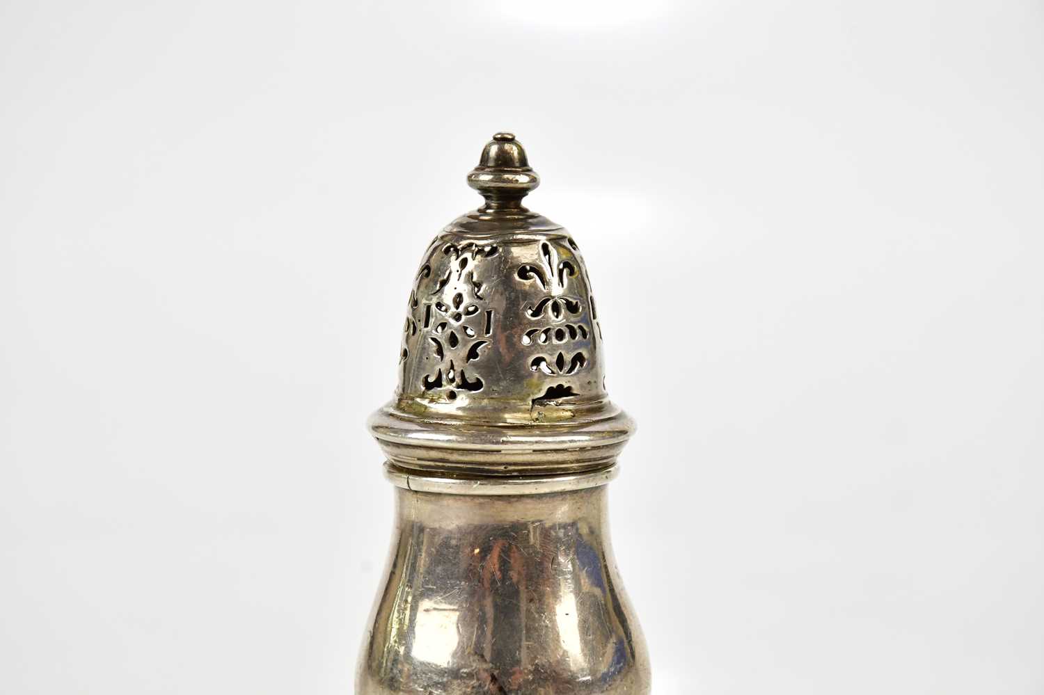 A George I hallmarked silver pepperette of baluster form, with cast acorn finial, the body - Image 4 of 5