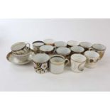 A collection of thirteen early 19th century English porcelain coffee cans and cups, to include a can