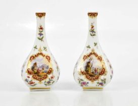 AUGUSTUS REX FOR MEISSEN; a pair of hand painted vases with floral decoration and shipping scenes,
