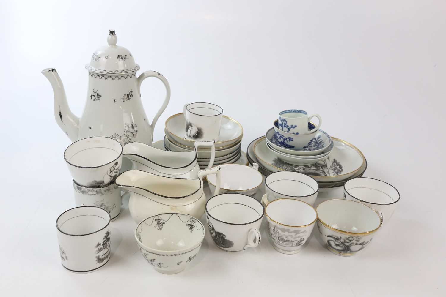 NEW HALL; a collection of twenty-five tea and coffee wares, decorated with monochrome patterns and