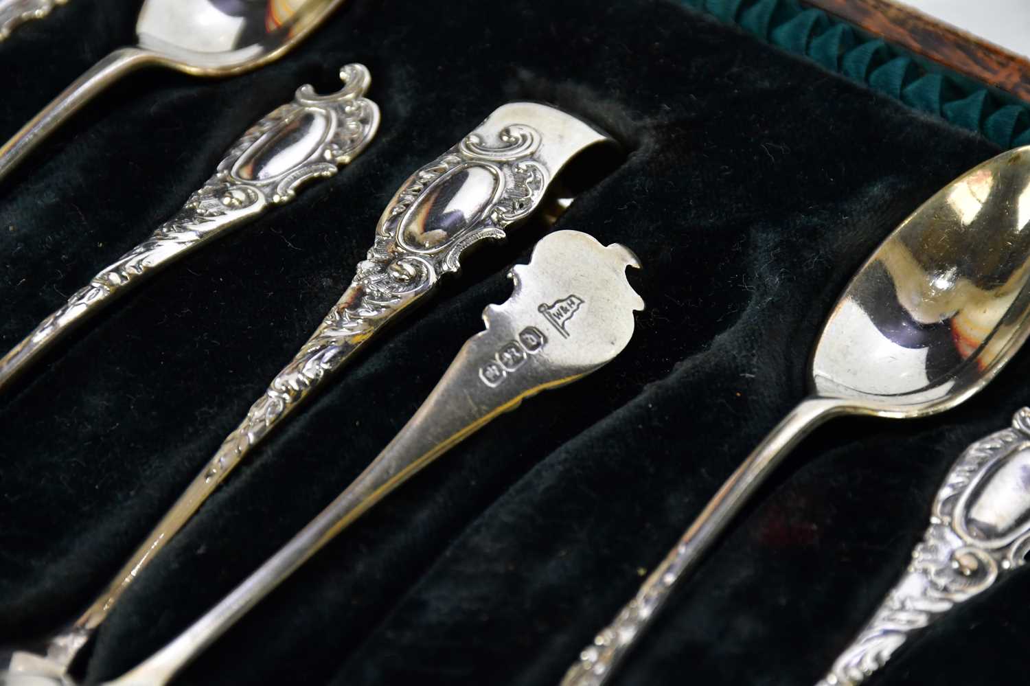 WALKER & HALL; a cased set of six Victorian hallmarked silver tea spoons and sugar tongs, - Image 2 of 4