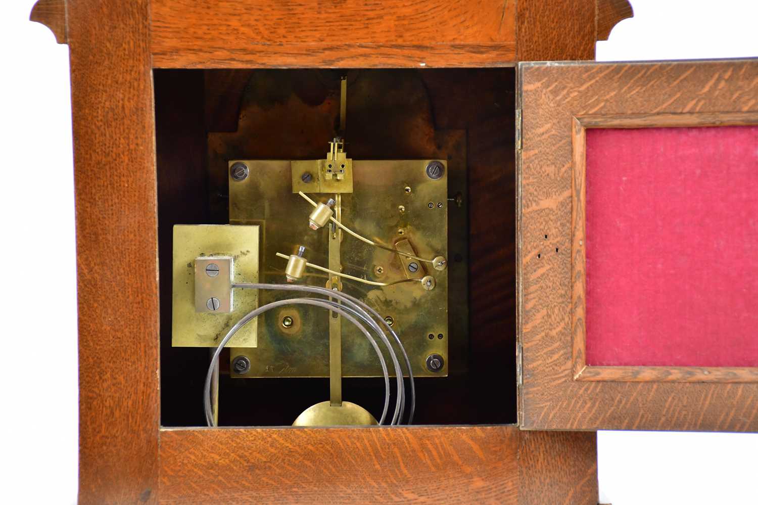 An early 20th century oak mantel clock with applied brass urn finial and four further scrolling - Image 5 of 6