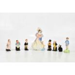 ROYAL DOULTON; a small collection of figures comprising HN3708 'Catherine', HN2045 'She Loves me