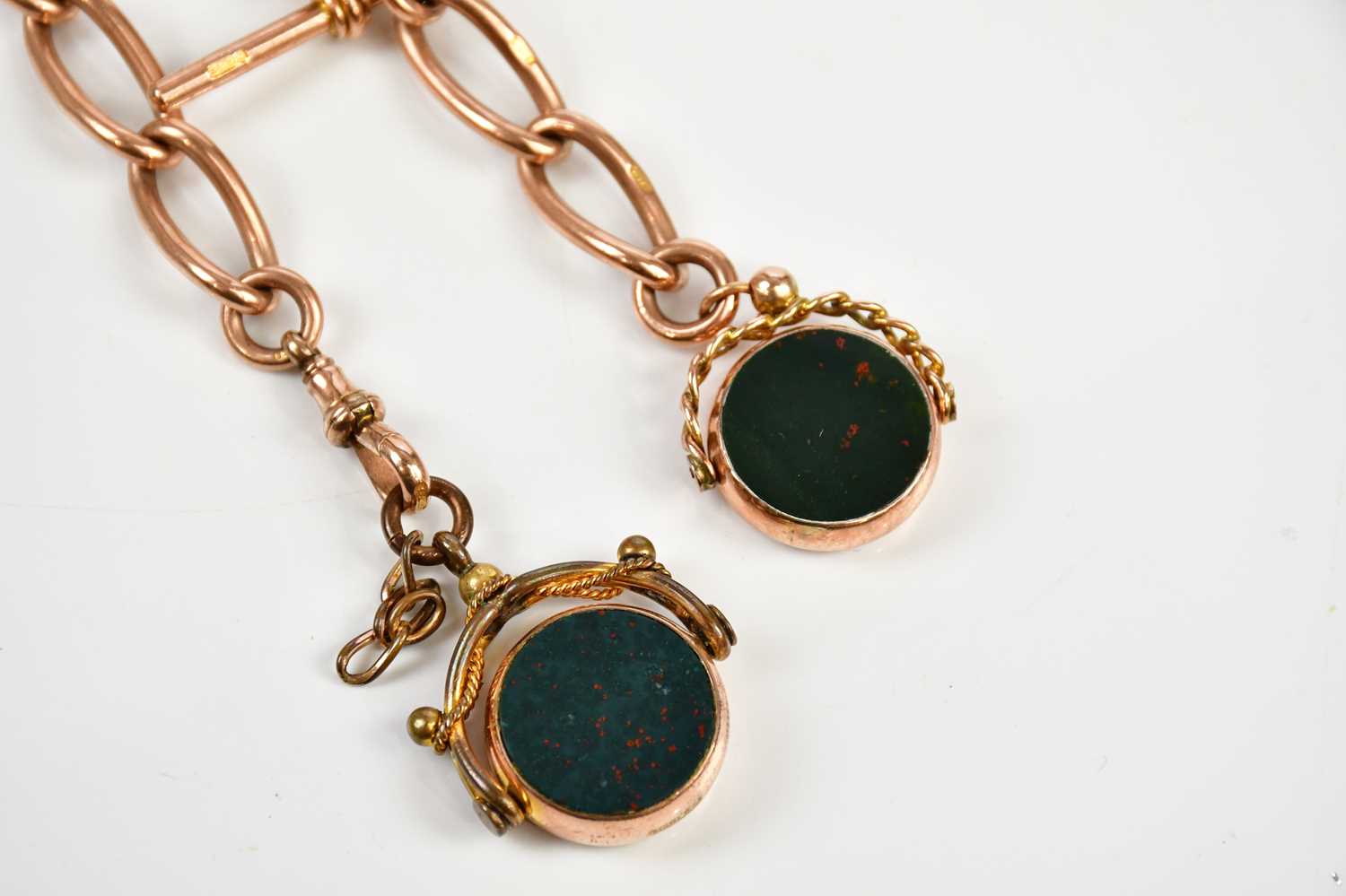 A 9ct yellow gold fob chain with two blood stone fobs, approximate weight 74.8g. - Image 2 of 4