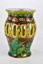 A Victorian majolica garden seat with relief and pierced decoration, height 52cm.