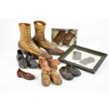 A pair of late Victorian/Edwardian two tone leather lady's boots, two framed panels of children's