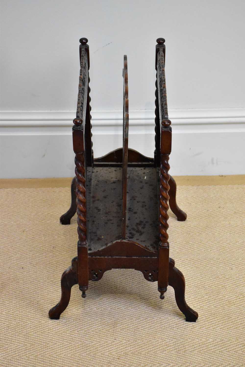 An early 20th century carved Canterbury with cane work sides. - Image 3 of 3