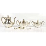 X J E CALDWELL & CO; a George V sterling silver three piece tea set, stamped 'Sterling 1915',