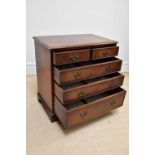 A reproduction mahogany chest of two short over three long drawers on bracket feet, width 79cm,