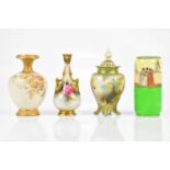 ROYAL WORCESTER; a floral decorated vase and a pierced lidded vase decorated with pheasants, also
