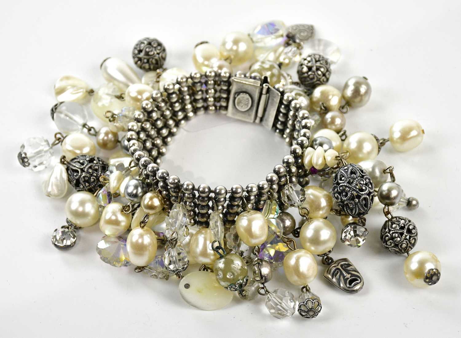 ASKEW, LONDON; a silver tone five strand ball bead bracelet with faux pearls, glass crystal and