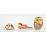 ROYAL CROWN DERBY; an animal form paperweight modelled as an owl, together with two similar animal