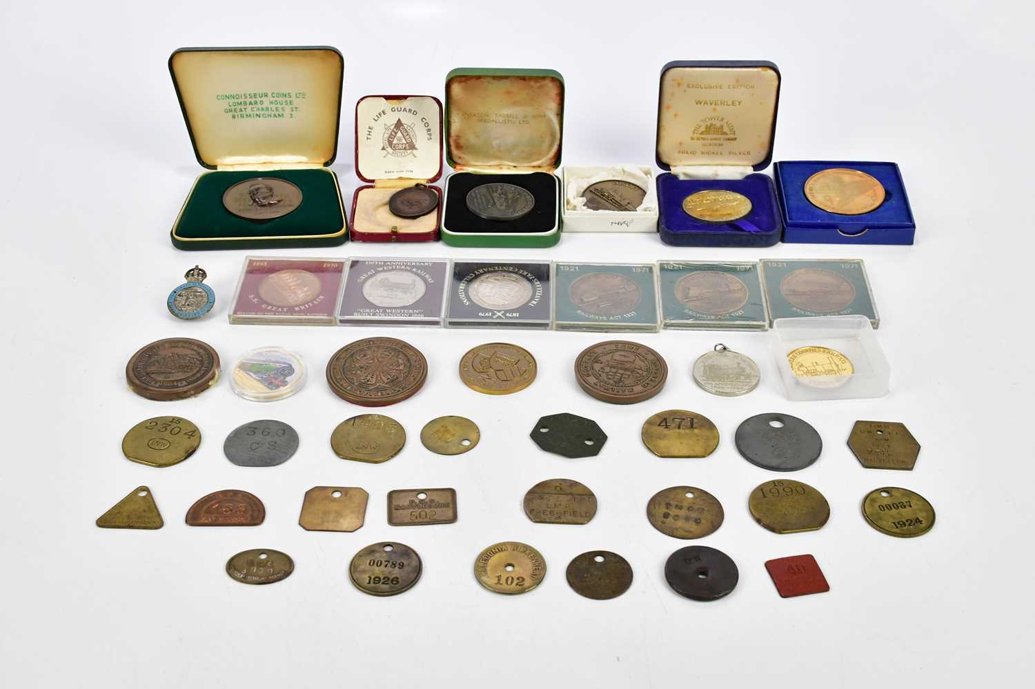 Approximately twenty-two assorted railway tokens/tallies, also a quantity of railway commemorative