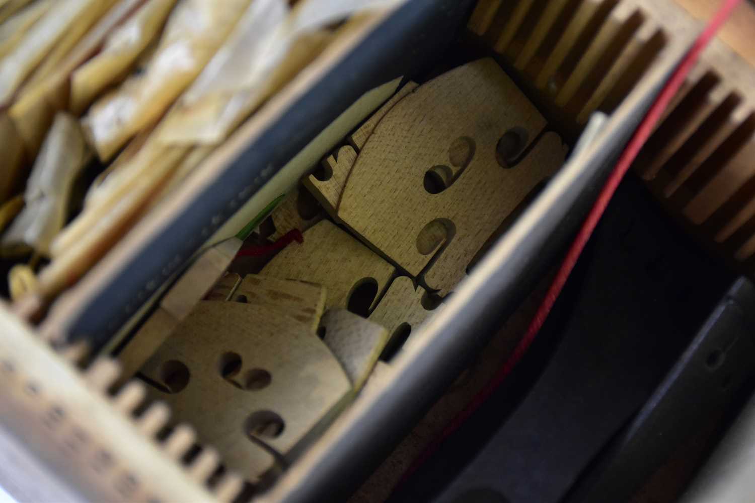A pine box containing various violin parts, with original label to the interior. - Image 7 of 7