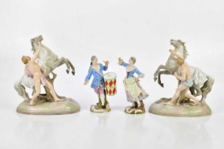 A pair of 19th century Meissen figures representing a drummer man and a girl with flowing dress,