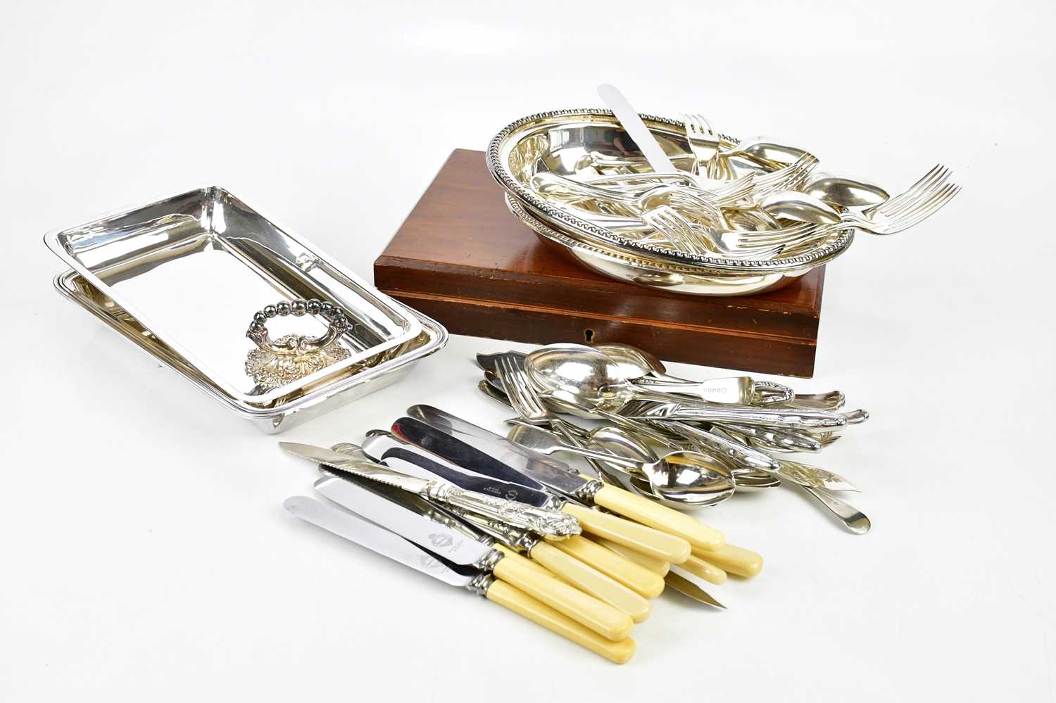 A collection of assorted silver plate including entree dishes and flatware.