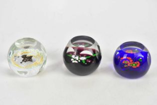 CAITHNESS; three limited edition faceted glass paperweights including 'Scarlet', 'Brocade Butterfly'