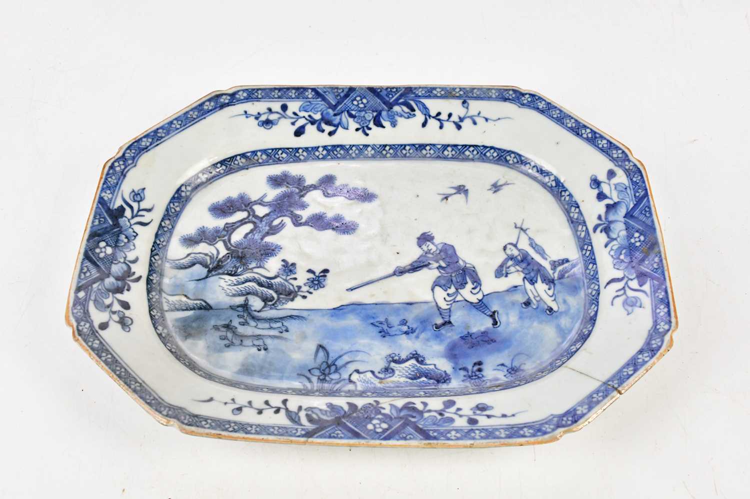 An 18th century Chinese blue and white Export ware plate, decorated with a hunting scene, 27x35.