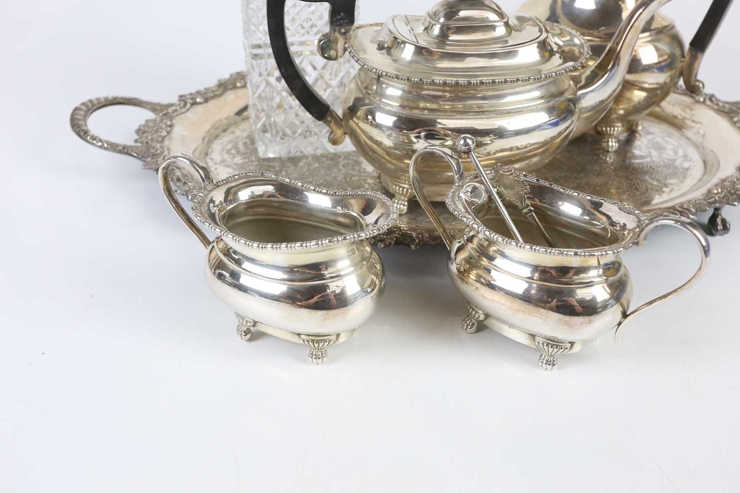 A silver plated four piece tea service with twin handled tray and cut glass decanter. - Image 2 of 5