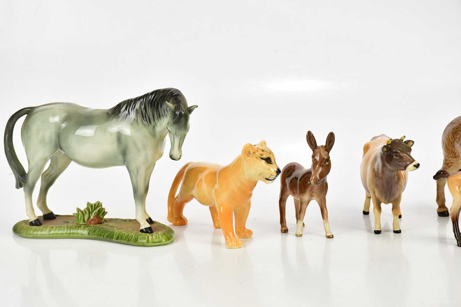 BESWICK; a collection of figures to include cow, donkey, lion, deer, etc. - Image 2 of 3