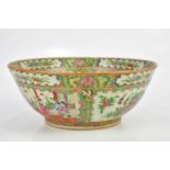 An early 20th century Chinese Famille Rose Canton footed bowl, decorated in panels with figures,