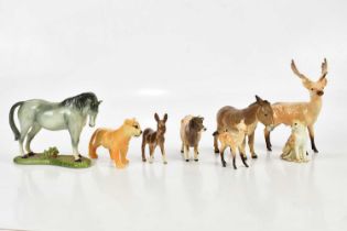 BESWICK; a collection of figures to include cow, donkey, lion, deer, etc.