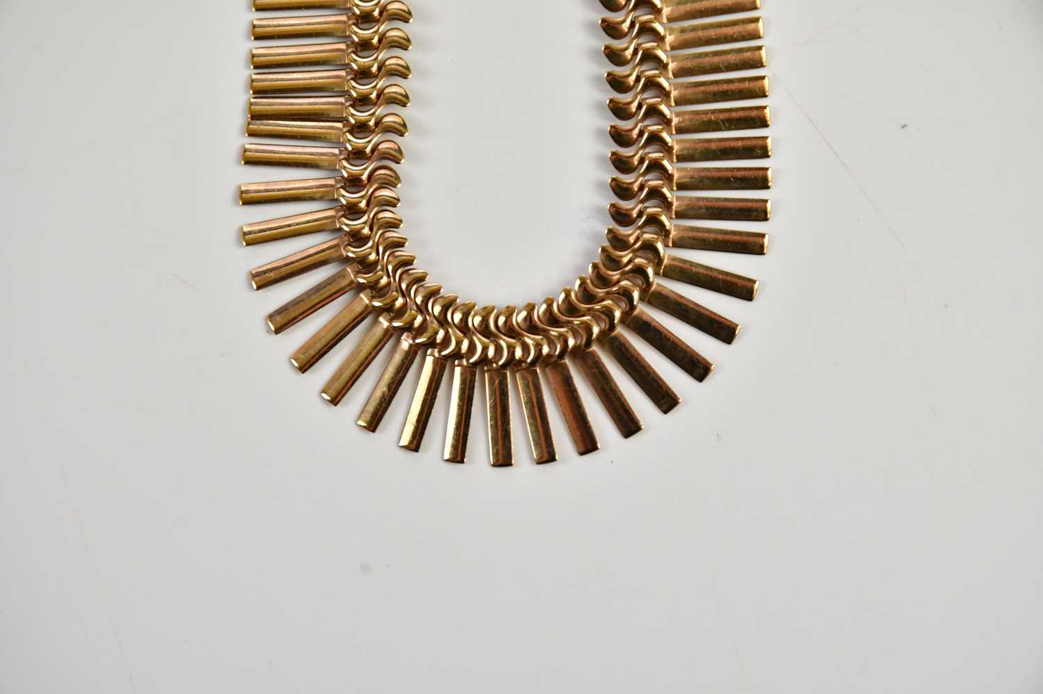 A yellow metal fringe collar necklace, stamped 9c, approx weight 22.6g. - Image 2 of 4