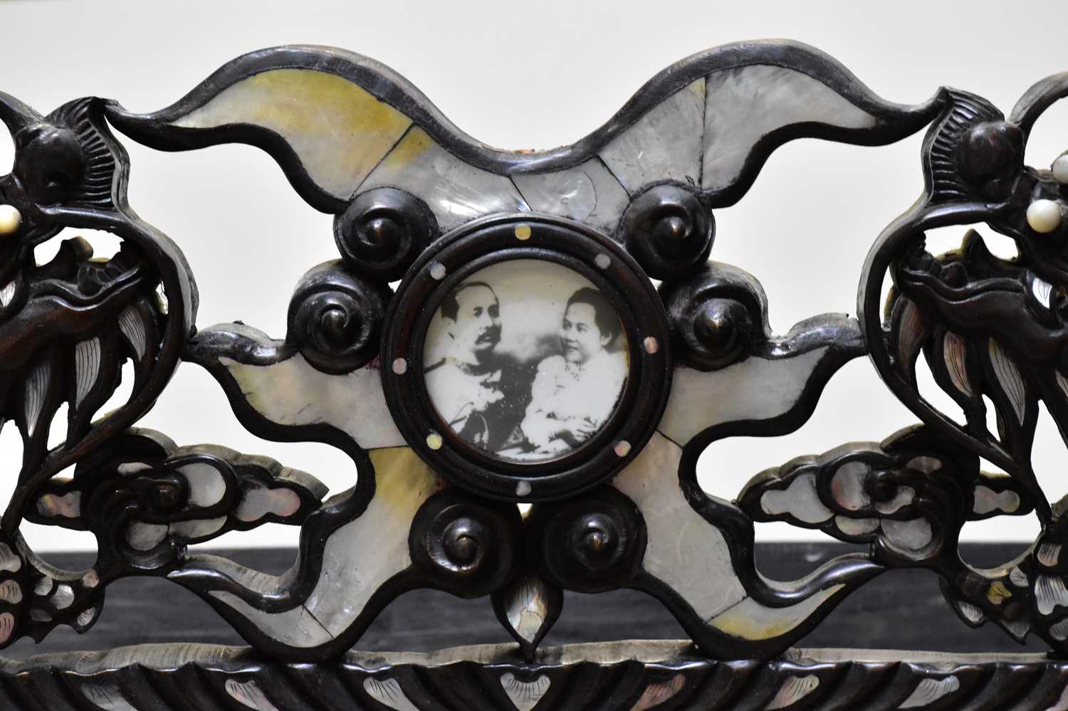 A Chinese ebonised carved display cabinet with mother of pearl inlaid decoration depicting - Image 3 of 13