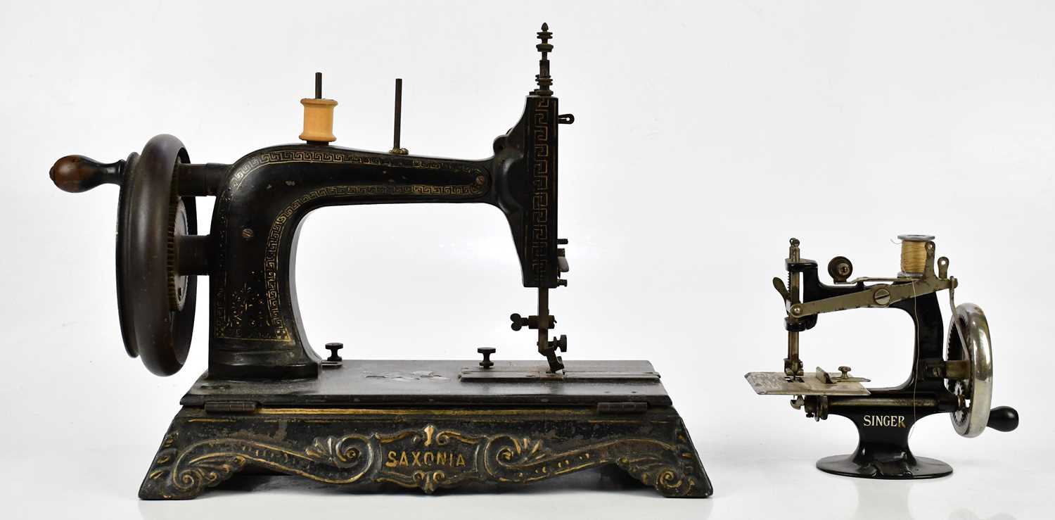 SAXONIA; a vintage manual sewing machine with mother of pearl and gilt decoration, length 35cm,