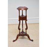A reproduction mahogany wig stand with two drawers, height 86cm.