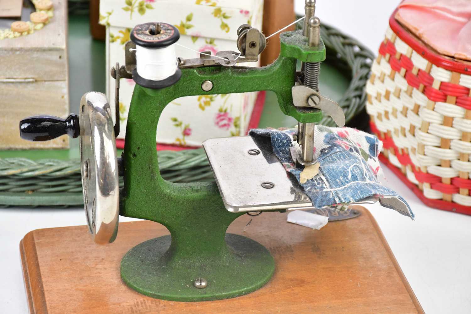 GRAIN; a miniature tabletop sewing machine with part original box, sewing basket and assorted sewing - Image 2 of 4