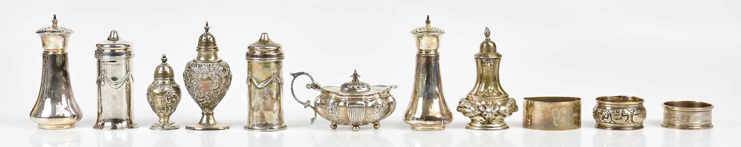 ROBERTS & BELK; a pair of Edward VII hallmarked silver salt shakers, with cast swags and bows,